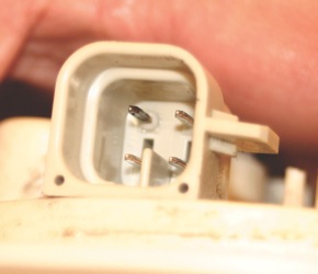 Even a slight discoloration on the positive terminal of the fuel pump connector can indicate a voltage drop that could cause a driveability problem. 